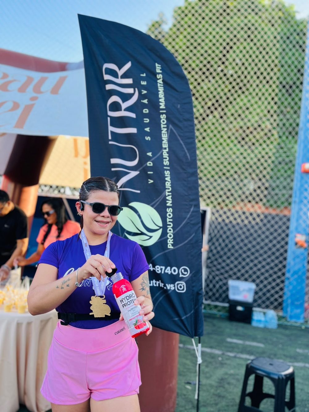 Estande da Nutrir Vida Saudável em evento de corrida em Sobral